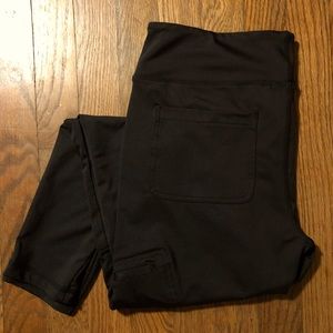 Athletic pants with side zipper pocket